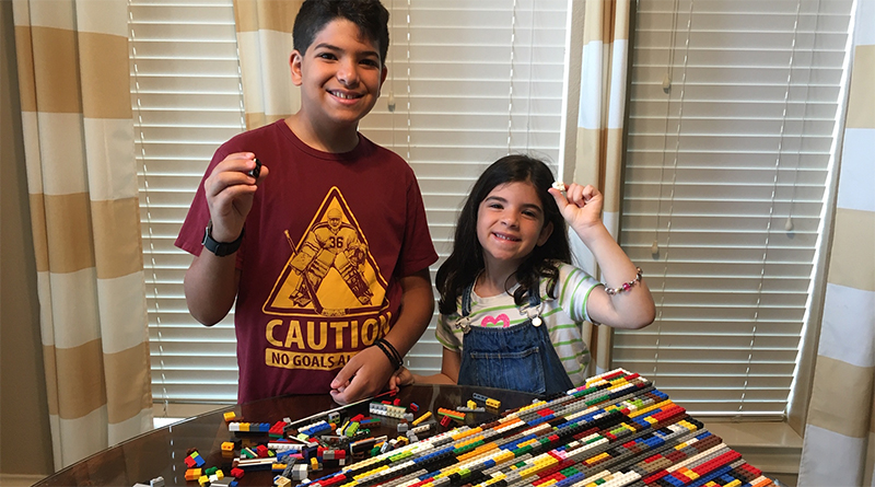 Children build LEGO wheelchair ramp for their dad